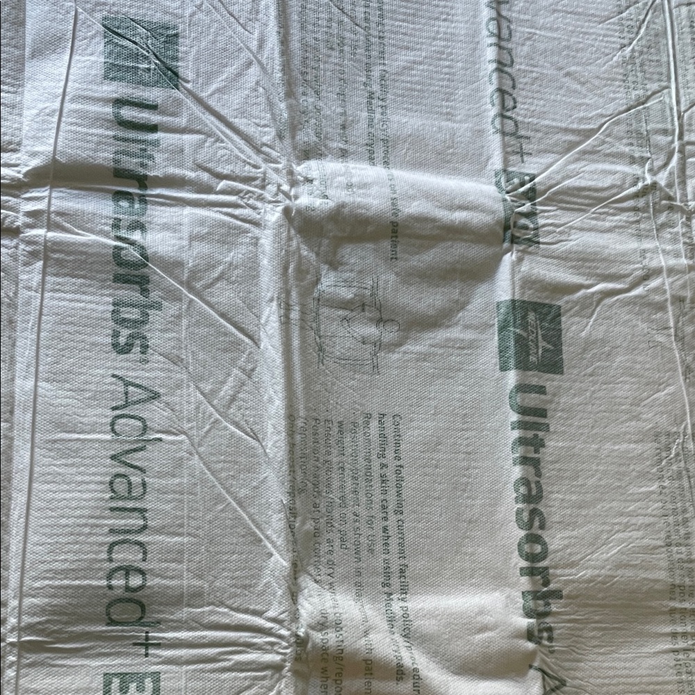 Medline Disposable Mattress Underpads - White with Mint Green Print (Pack of 10) - Picture 5 of 10